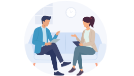 Two people talking on a couch