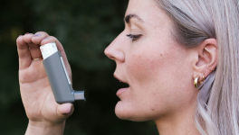 Woman about to use inhaler