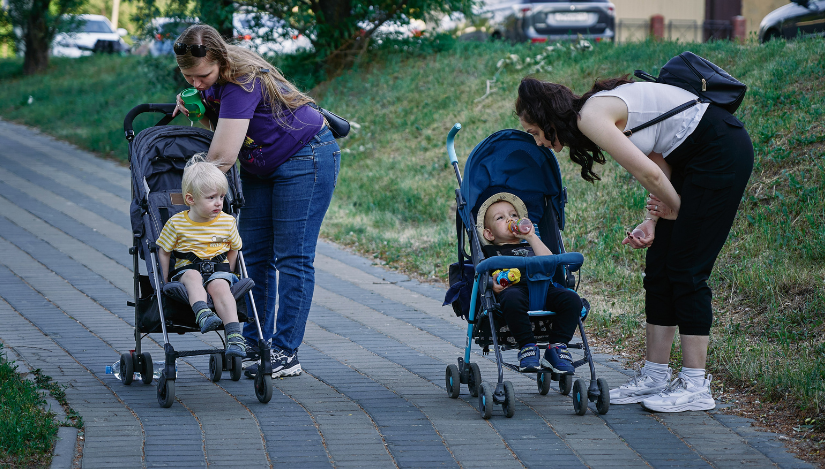 Moms with babies in strollers