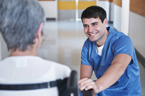 Nurse and a patient in a wheelchair