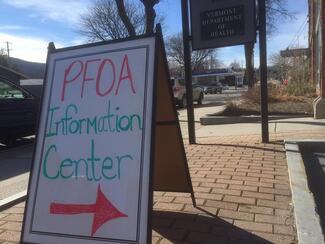 sign that says PFOA information center